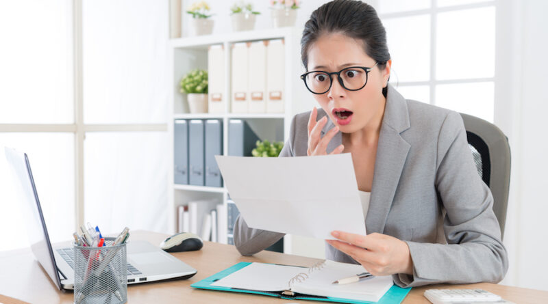 Shocked boss reading a perfect resignation letter